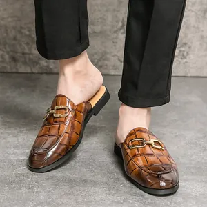Stylish men's brown crocodile patterned leather backless loafers with elegant gold buckle