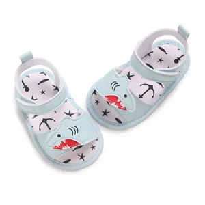Cute light blue baby shark sandals with soft soles and nautical star patterns