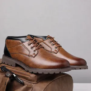 Detailed side view of brown leather lace-up boots showing texture and stitching