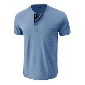 Detailed macro view of a blue short-sleeved men's Henley shirt with pocket and buttons