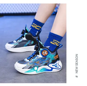 Close-up detail of boys' breathable mesh basketball shoes featuring a rotary buckle closure.