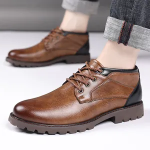Detail view of brown faux leather low-top Martin boots with lace-up design for men