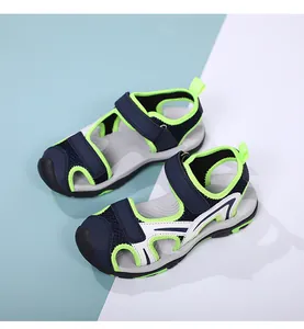 Top-down view of breathable closed-toe navy and lime green boys' sports sandals