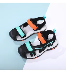 Closed-toe boys sports sandals with breathable mesh and vibrant orange straps