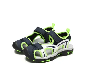Durable breathable closed-toe boys sports sandals with adjustable velcro straps in navy lime