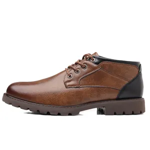 Detailed side view of men's low-top brown faux leather work boots with black heel