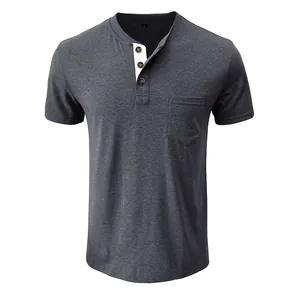 Detail view of men's charcoal grey Henley t-shirt with contrast white button placket