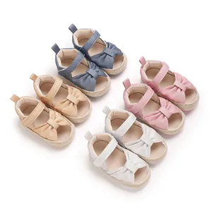 Collection of classic infant baby sandals with soft soles in four soft pastel colors