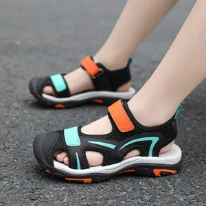 Breathable boys closed-toe athletic sandals with non-slip soles and mint green accents