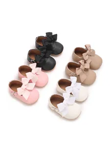 Collection of PU leather baby girl princess shoes with bows in multiple colors.