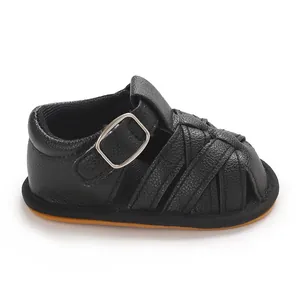 Classic black baby boy summer sandals with breathable woven design and soft sole.