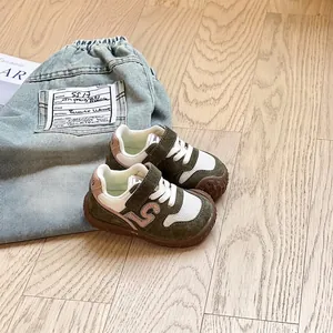 Close-up of breathable mesh fabric and soft rubber sole on these toddler walking shoes
