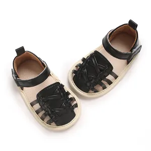 Sandales d'été pour bébés en cuir noir avec semelle souple en caoutchouc pour nourrissons