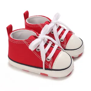 Red canvas baby sneakers with white laces for 0-1 year old infants