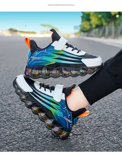 Detailed view of children's running shoes with vibrant gradient design and thick bubble soles