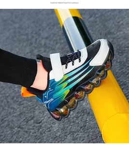 Detail view of children's sneaker with velcro strap and colorful air-cushioned sole