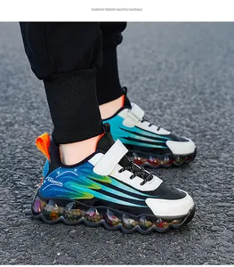 Detail macro view of stylish children's running shoes with mesh upper and wavy sole design