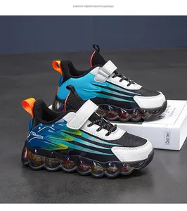 Detailed view of children's colorful sneakers with velcro and bubble soles.