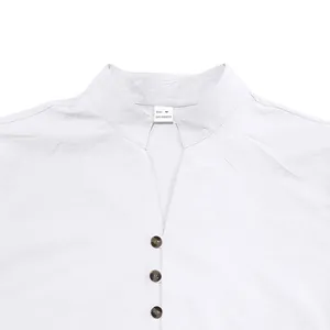 Macro detail of men's white casual shirt featuring V-neck stand collar and buttons