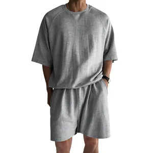 Macro view of grey French terry fabric on men's short sleeve crew neck lounge set