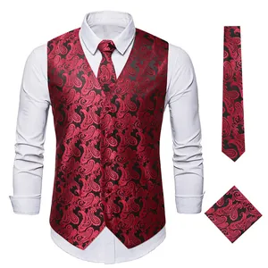 Detailed view of red and black paisley men's waistcoat with matching tie and pocket square