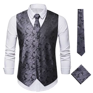Elegant men's charcoal paisley waistcoat set with matching necktie and pocket square.