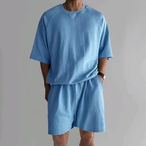 Detailed view of men's blue French Terry t-shirt and shorts set for casual wear