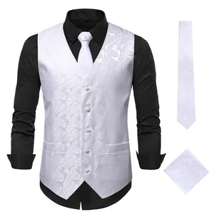 Macro view of white paisley jacquard embroidered vest with matching tie and square