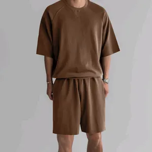 Men's casual brown terry cloth two-piece set including t-shirt and lounge shorts