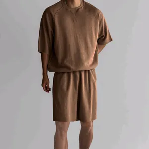 Detail view of men's coffee-colored French Terry lounge set with shorts and tee