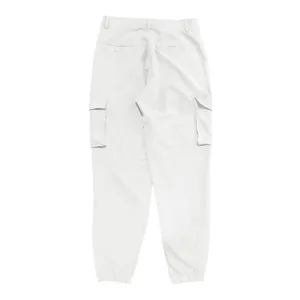 Back view of men's white cargo jogger pants with multiple utility pockets