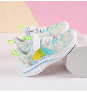Side detail of girls' tie-dye mesh sneakers with Velcro strap and white sole