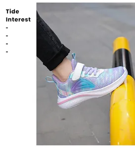 Close-up of girl's breathable mesh running shoe with vibrant gradient purple design