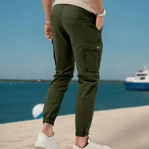Rear view detail of olive green men's cargo joggers with elastic cuffs and side pockets.