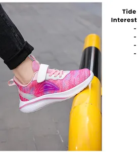 Side detail view of lightweight pink girl's sneakers with breathable mesh for sports