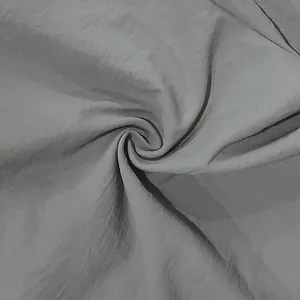 Detailed macro shot of grey vintage linen fabric texture for men's casual shirt