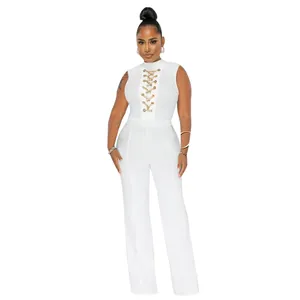 Sleeveless white mock-neck jumpsuit featuring sexy gold chain lace-up chest detail