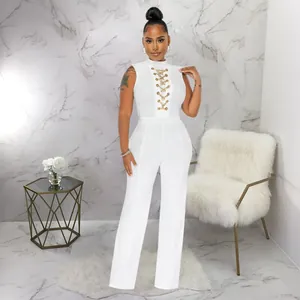 Elegant white sleeveless mock neck wide leg jumpsuit with front gold chain lace-up