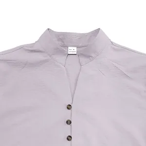 Detailed view of lavender linen-look casual shirt showing buttons and V-neckline