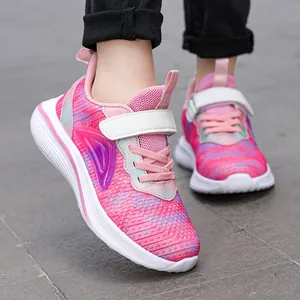Comfortable and lightweight pink mesh athletic running shoes for girls aged 6 to 12 years