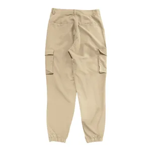 Back view of men's khaki cargo pants featuring multiple pockets and elastic cuffs