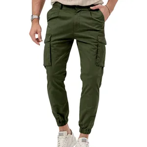 Men's dark green cargo pants with functional side pockets and elasticated jogger cuffs.