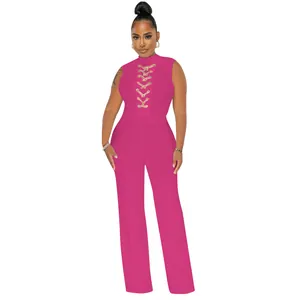 Sleeveless high-neck pink jumpsuit with front lace-up detail and wide-leg trousers