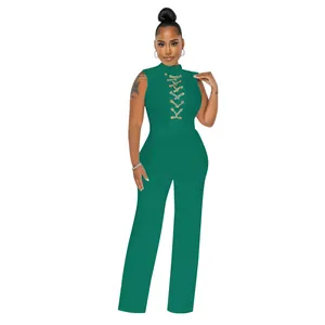 Detailed view of a dark green sleeveless lace-up jumpsuit with wide-leg trousers