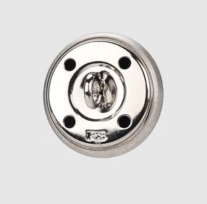 Macro view of a premium silver metal button back showing shank and IRIS engraving