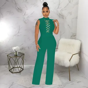 Sexy sleeveless high neck green jumpsuit with lace-up chain detail and wide leg pants