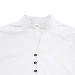 Close-up view of white stand-up collar men's shirt with buttons and size M neck label.