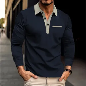 Detailed view of a men's navy blue long-sleeved polo shirt with a beige contrast collar