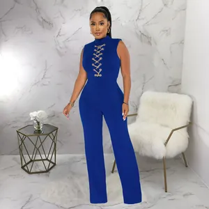 Elegant royal blue sleeveless wide leg jumpsuit featuring gold chain lacing details on chest