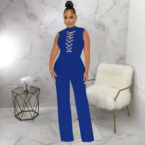 Elegant royal blue sleeveless jumpsuit with sexy lace-up front and wide-leg design.